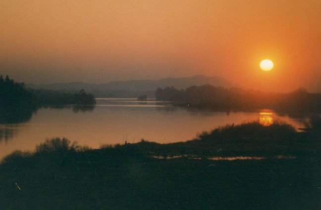 ID87 - Agosto - Pôr do Sol visto da Ponte de Lanheses. Viana do Castelo